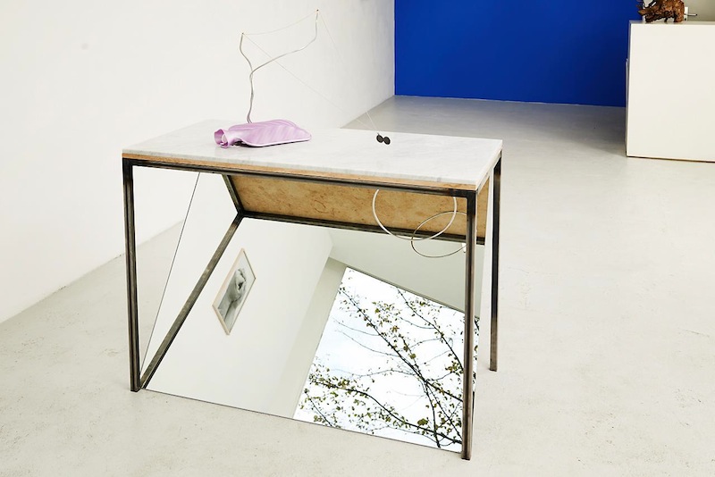 Navid Nuur ‘Wiki Table’, 2012-2013 metal, marble, magnet, mirror, hot-water bottle, vitamin D, medallion, aluminum wire, linking ring